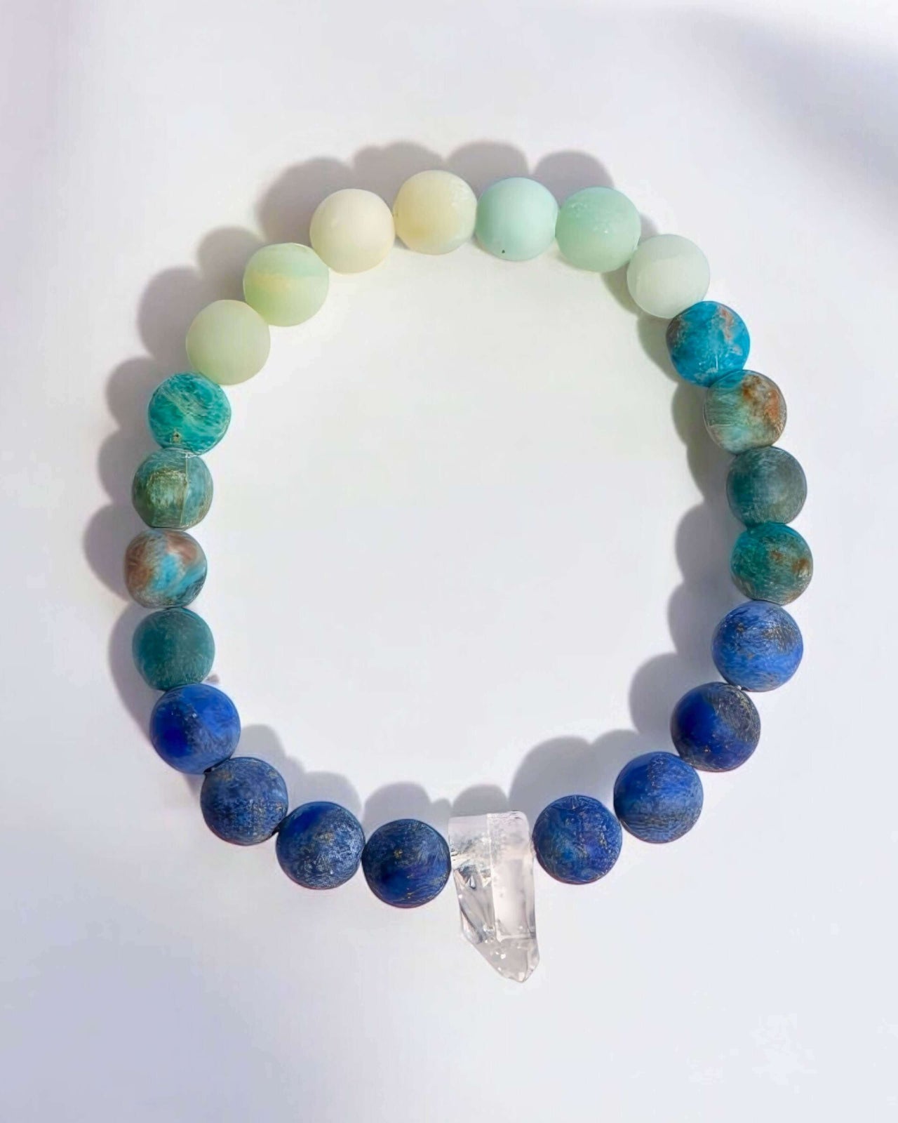 Clear Quartz Crystal, Lapis Lazuli, Apatite, and Amazonite gemstone bracelet.