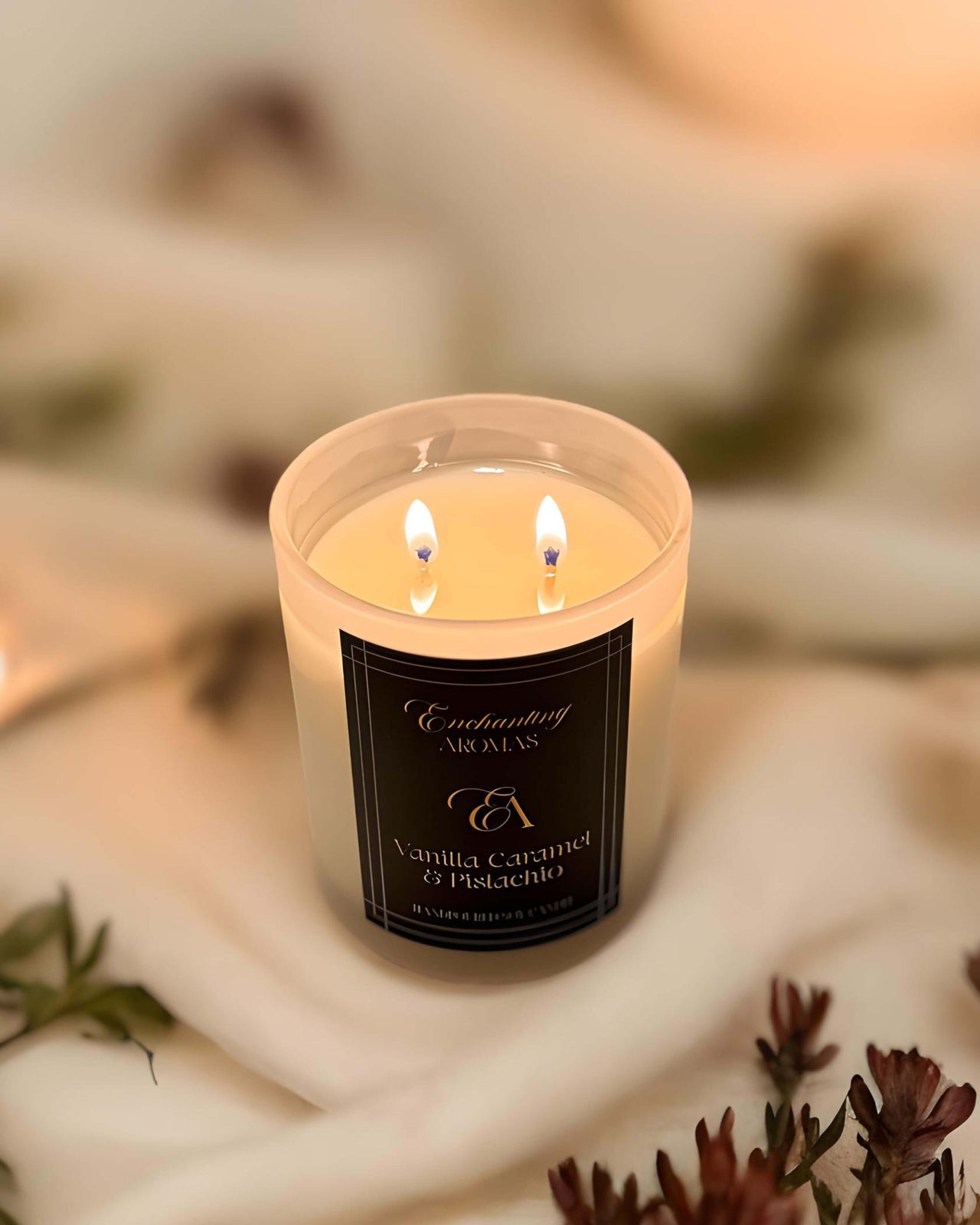 Luxe vanilla, caramel and pistachio candle burning brightly