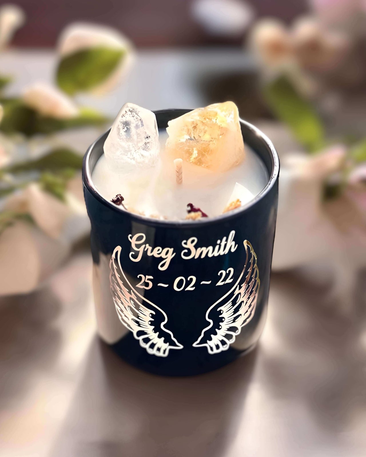 Citrine bereavement candle burning brightly