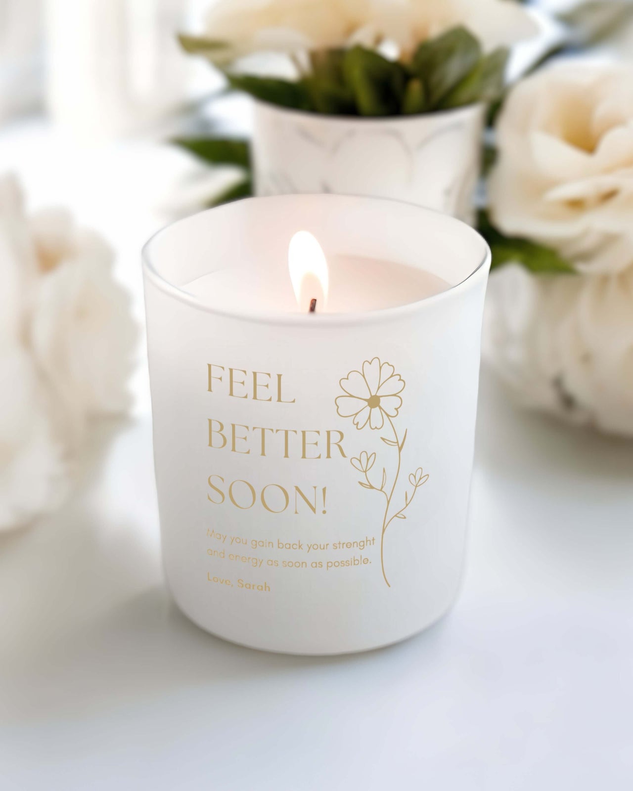 Get well soon candles with gold personalised inscription.