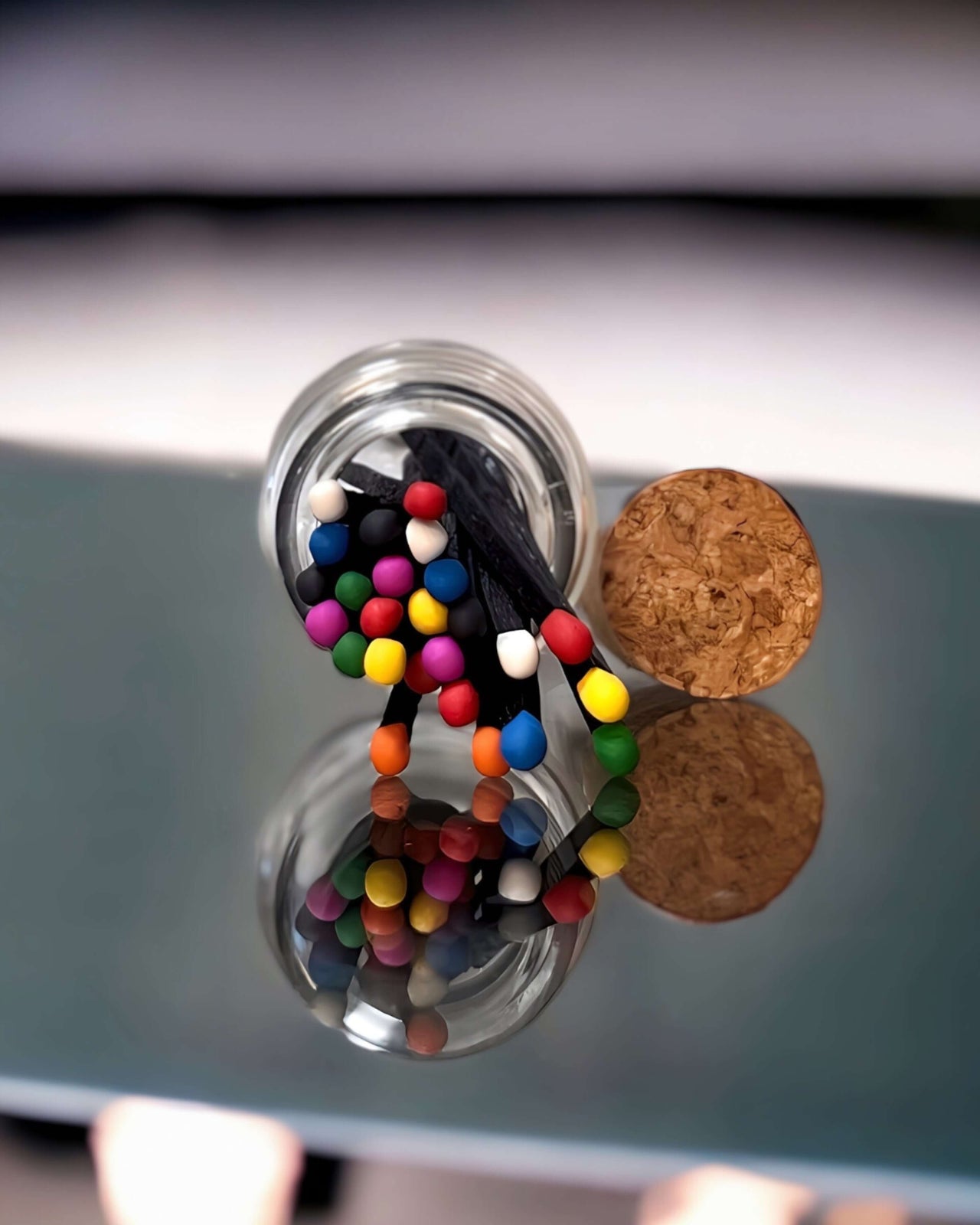 Stylish multicoloured matches come in a mini apothecary jar