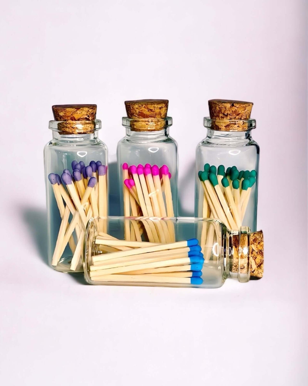 Stylish multicoloured matches come in a mini apothecary jar