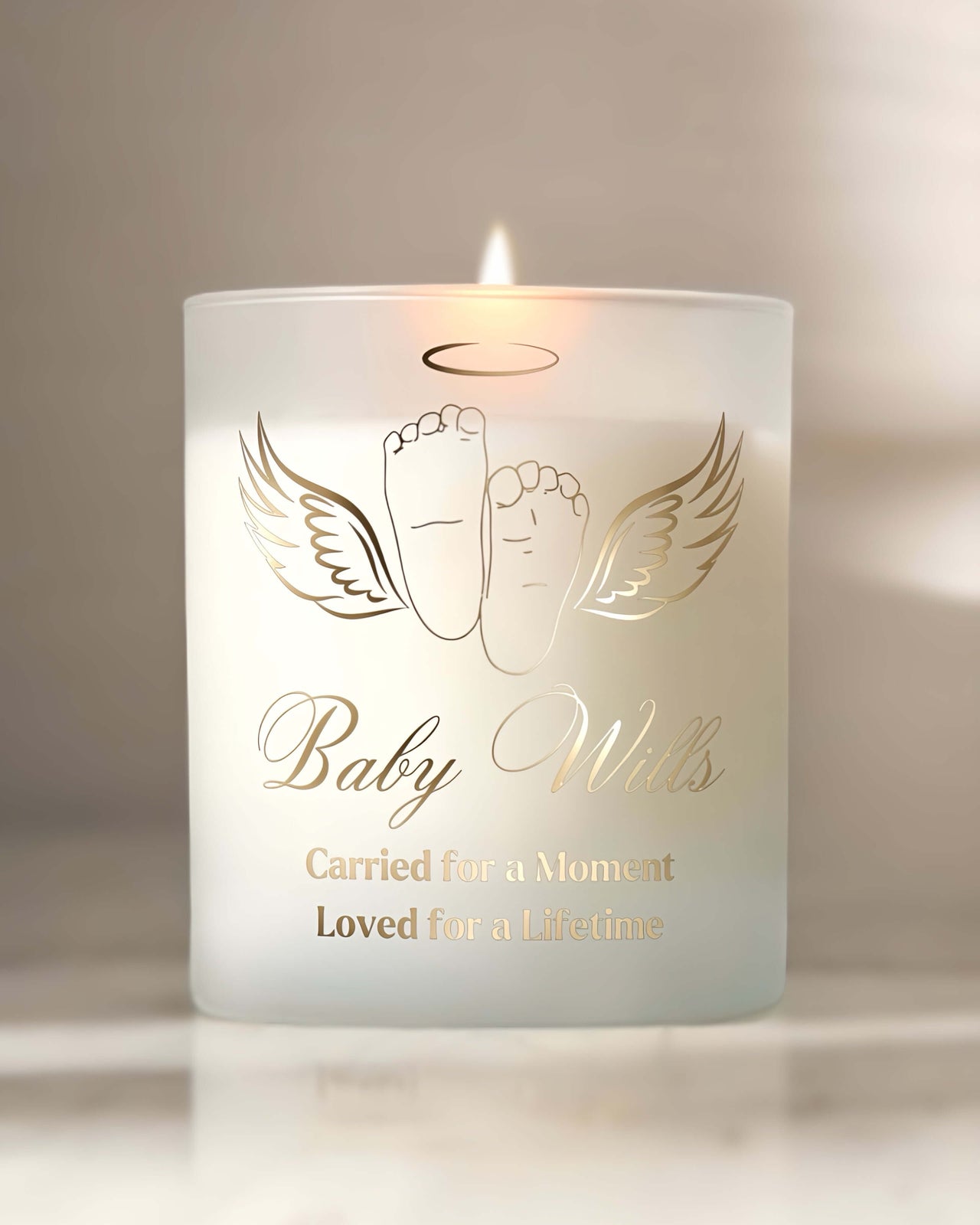 Custom candle features a delicate, gold-accented Angel Tiny Toes design