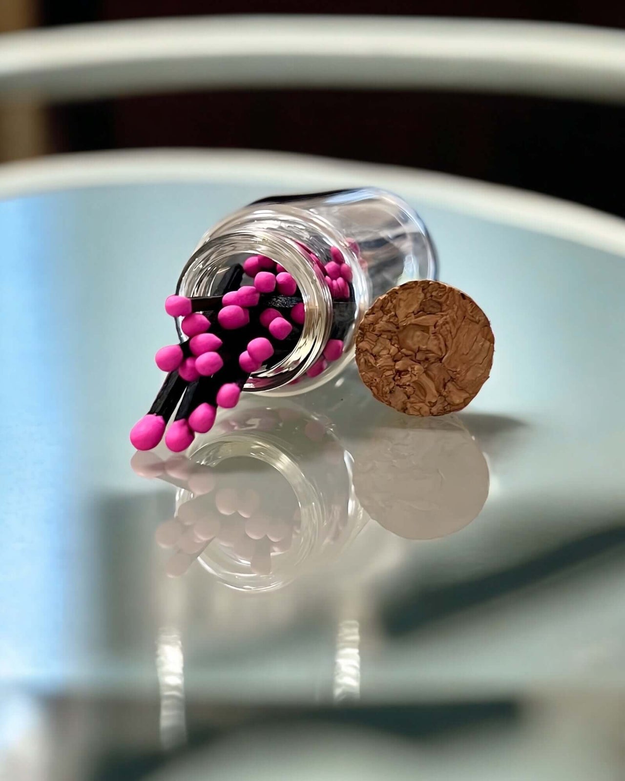 Stylish pink and black multicoloured matches come in a mini apothecary jar