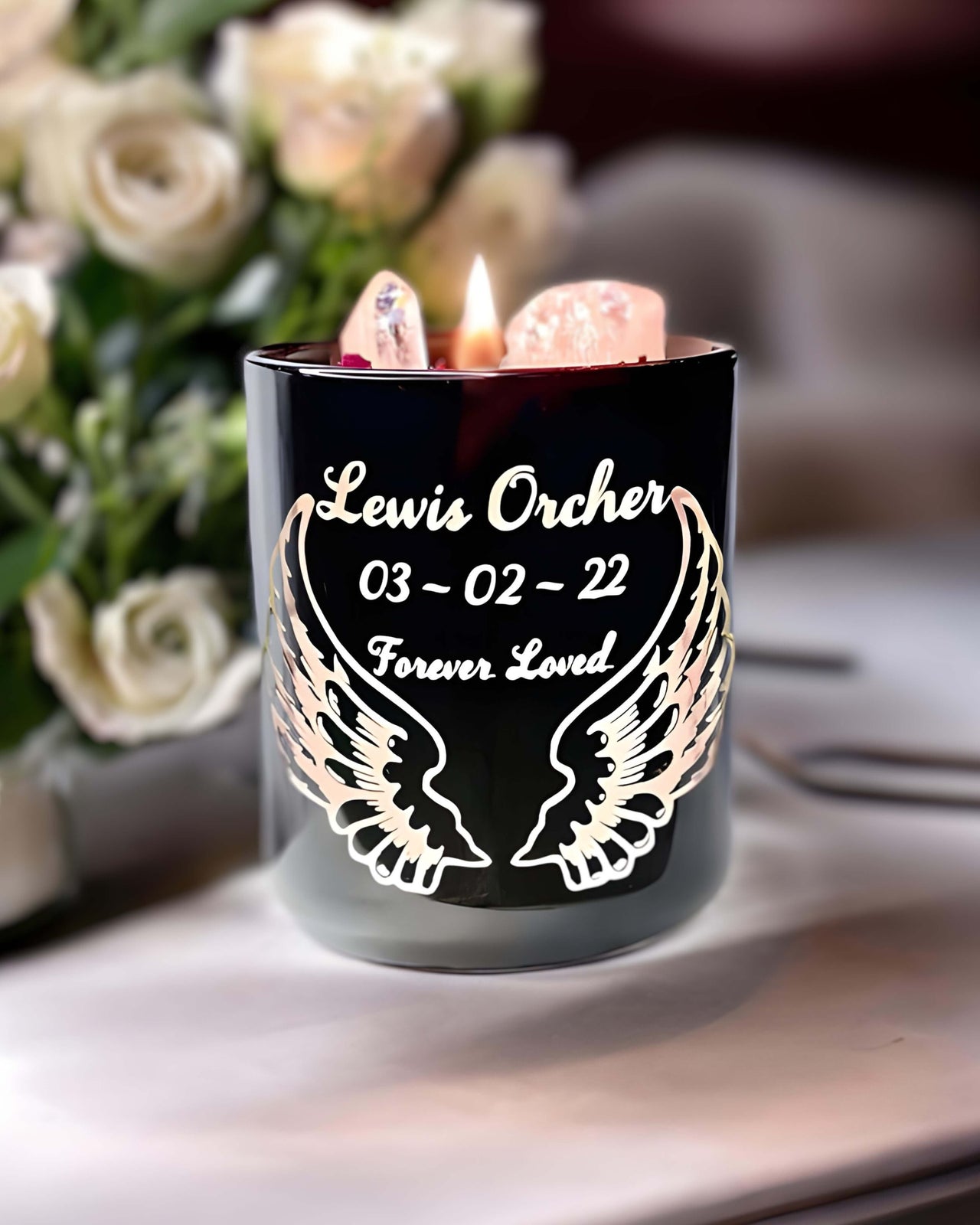 Black Rose Quartz bereavement candle burning brightly