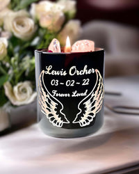 Thumbnail for Black Rose Quartz bereavement candle burning brightly