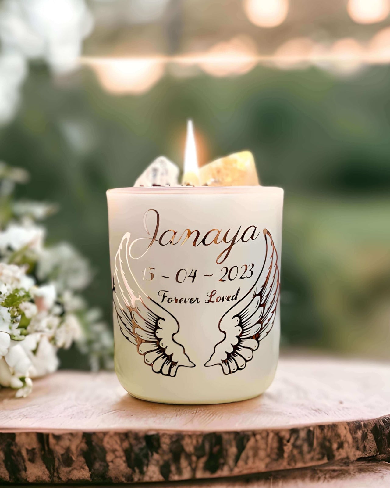 White citrine bereavement candle burning brightly