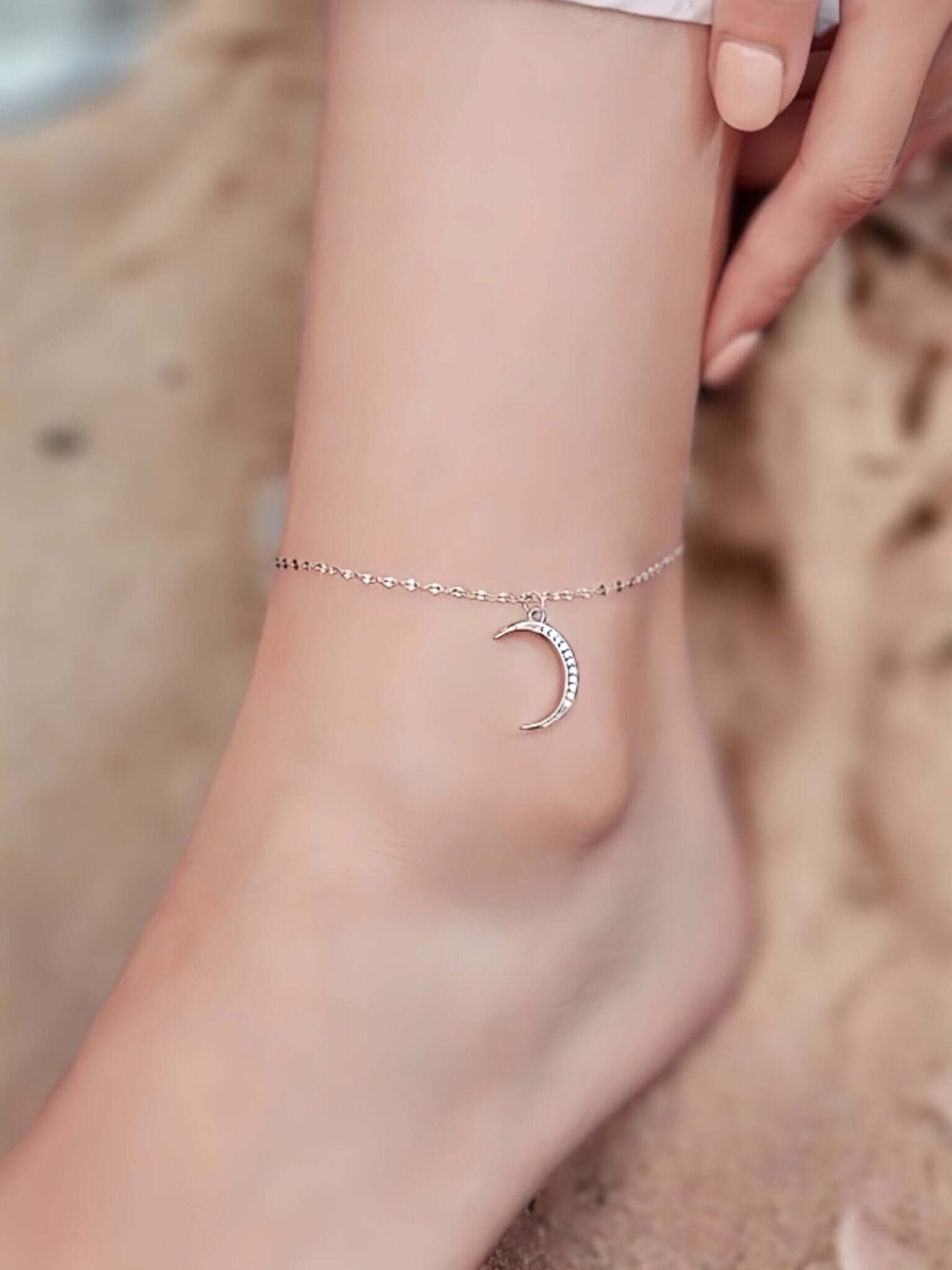 Adorn your ankle with our Sterling Silver Moon Anklet, embellished with Cubic Zirconia.