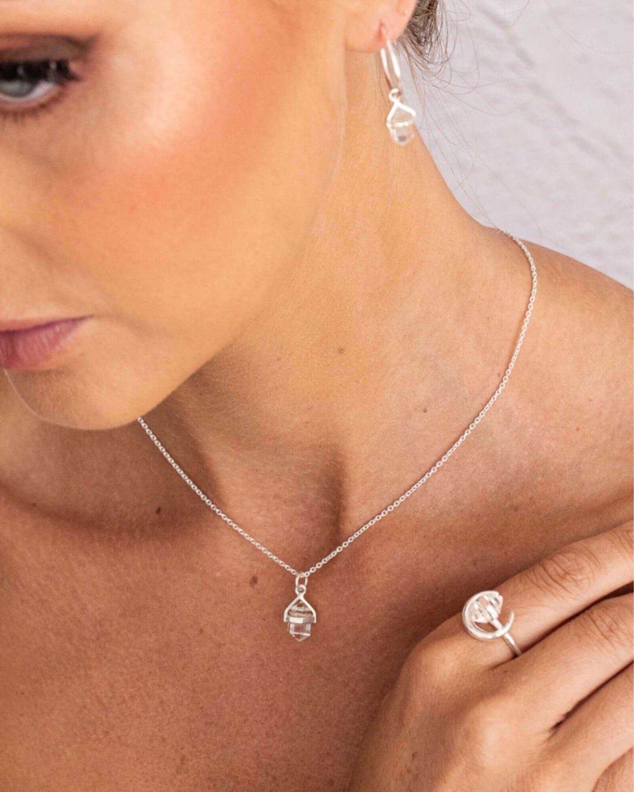 Discover the Clear Quartz Silver Necklace, a stunning piece of bohemian elegance. Double Pencil Point Clear Quartz for a sophisticated style. $79.95