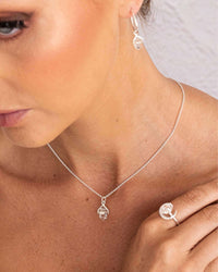 Thumbnail for Discover the Clear Quartz Silver Necklace, a stunning piece of bohemian elegance. Double Pencil Point Clear Quartz for a sophisticated style. $79.95