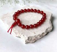 Thumbnail for Carnelian Gemstone Bracelet - Energy Boosting Jewelry Elevate your style with the 8mm Carnelian Energy Bracelet. A perfect blend of fashion and healing stone benefits for daily energy boost and wellness. $26.00