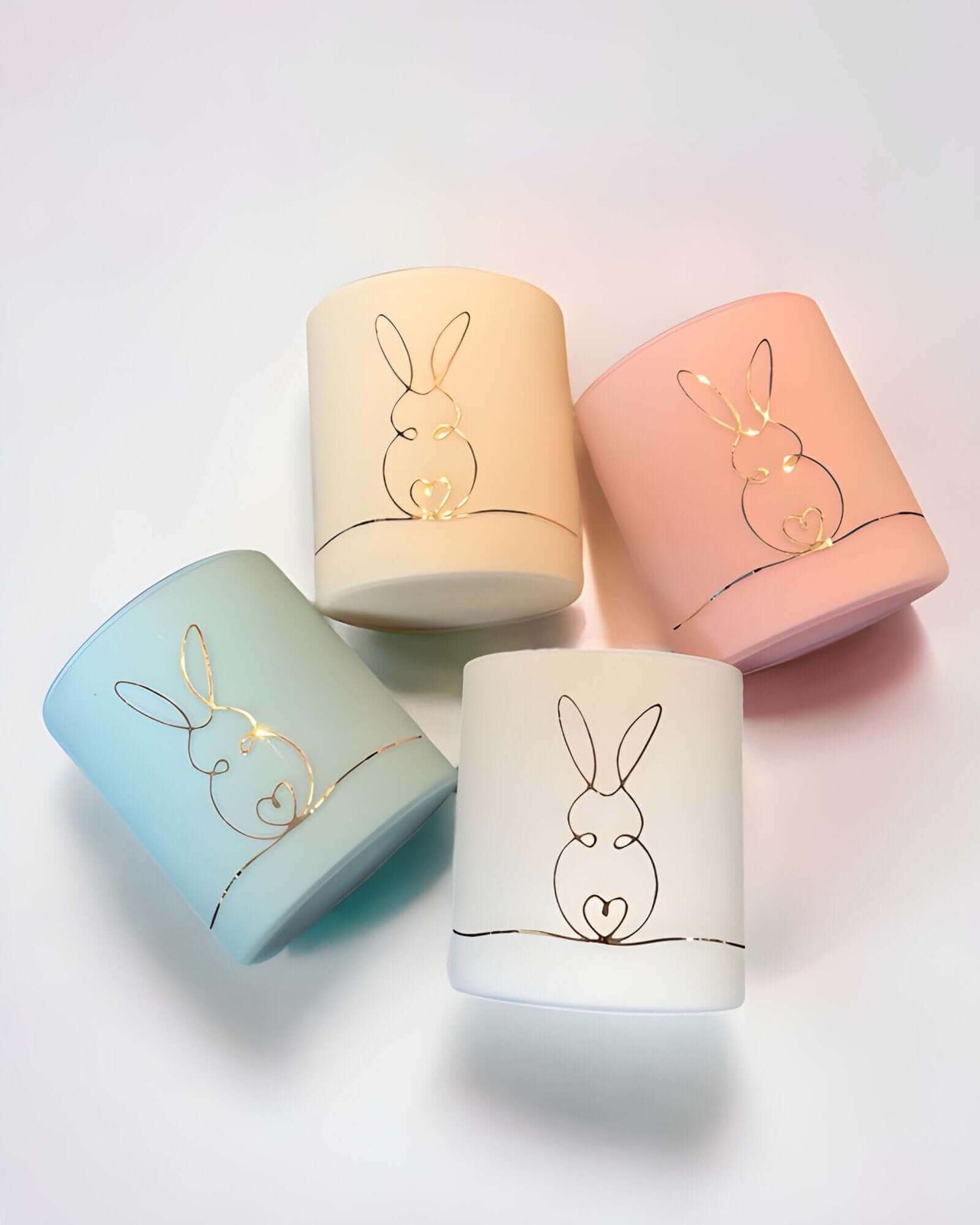 Bunny Love Candle with a wooden wick design for a cosy glow. Perfect Lemon Meringue scent for the season.