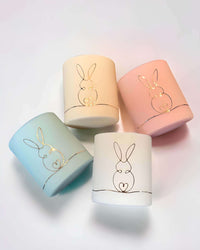 Thumbnail for Bunny Love Candle with a wooden wick design for a cosy glow. Perfect Lemon Meringue scent for the season.