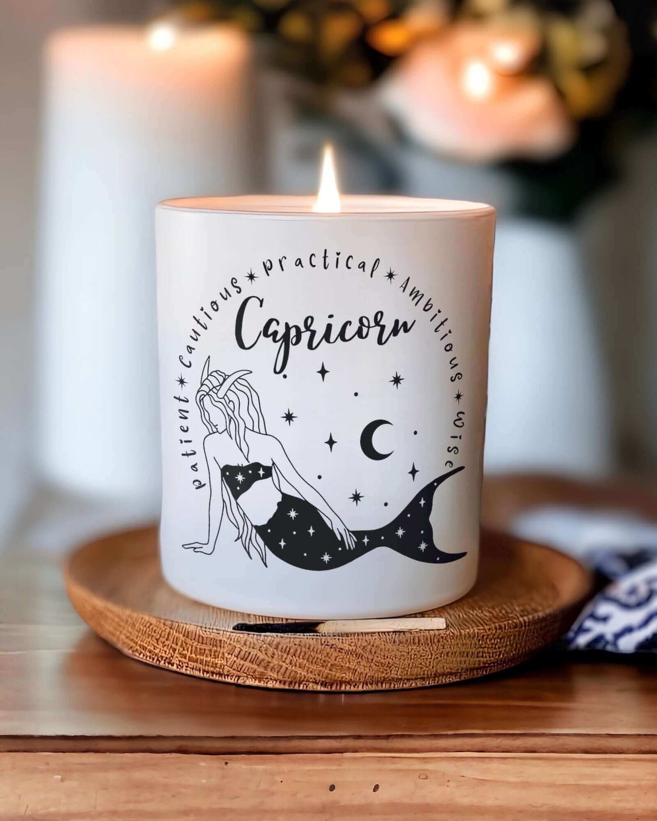 Capricorn Zodiac Candle - Garnet Infused Candle Embrace the Capricorn spirit with our Garnet Infused Candle. A unique Astrology Goddess Candle that reflects Capricorn's ambition and practicality. $49.00