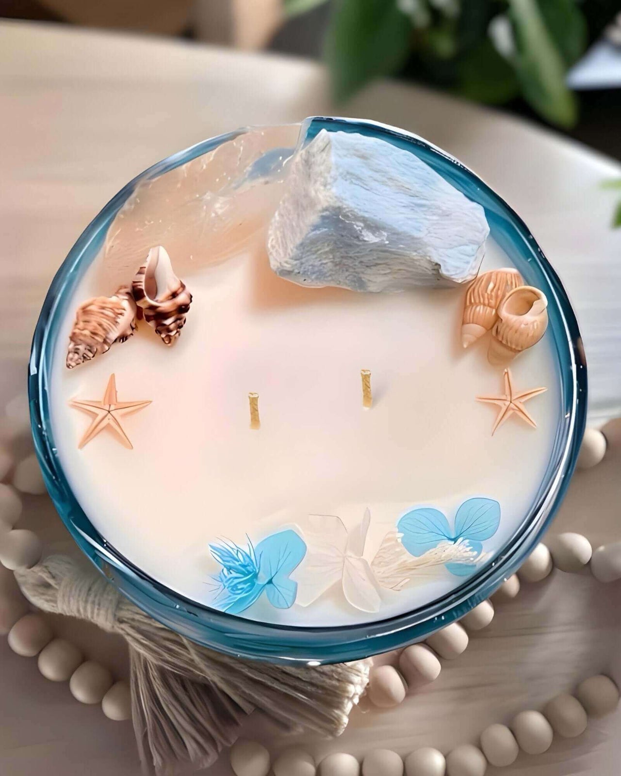 Experience luxury with the Coastal Tides Grand Luminary Candle. Over 100 hours of burn time with natural Amazonite and Clear Quartz. Perfect for elegant decor. $115.00