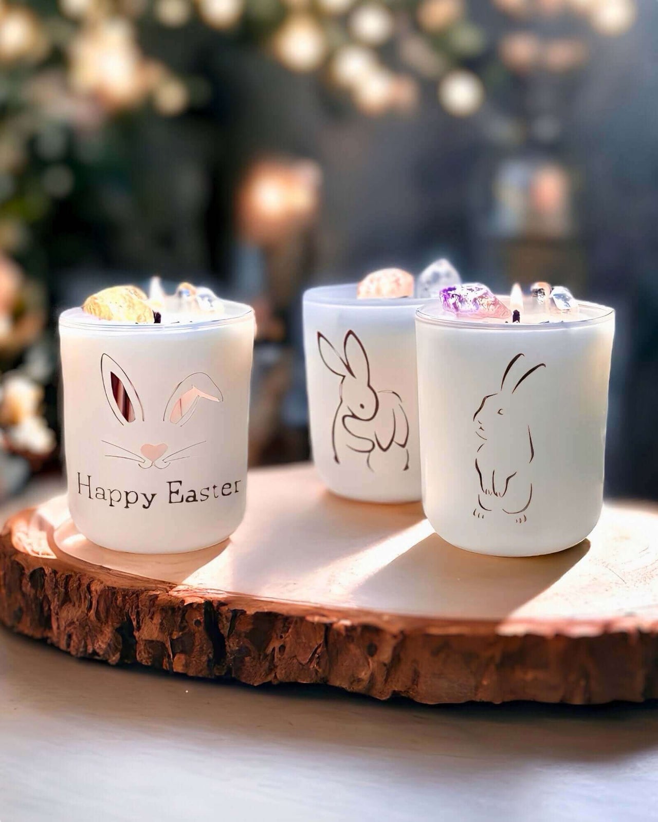 Discover the Luxury Easter Candle Trio, perfect for the Easter Celebration. Rose Quartz, Amethyst, and Citrine crystals add a unique touch to these handcrafted candles. $89.95