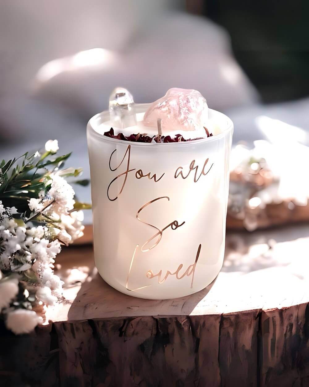 Elevate your sanctuary with our You are so loved candle, imbued with Rose Quartz for love, in chic black or white. Indulge in 50 hours of serenity.